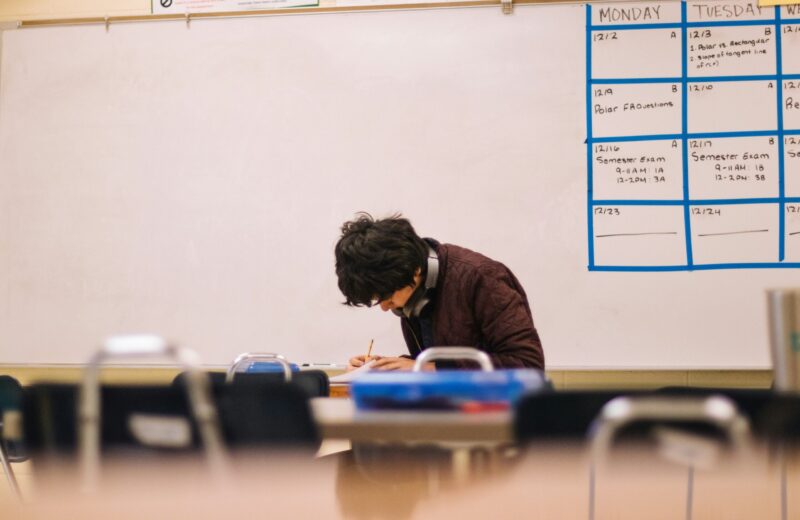 Student studying alone at desk